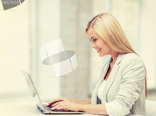 Image of businesswoman with laptop