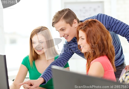 Image of group of smiling students having discussion