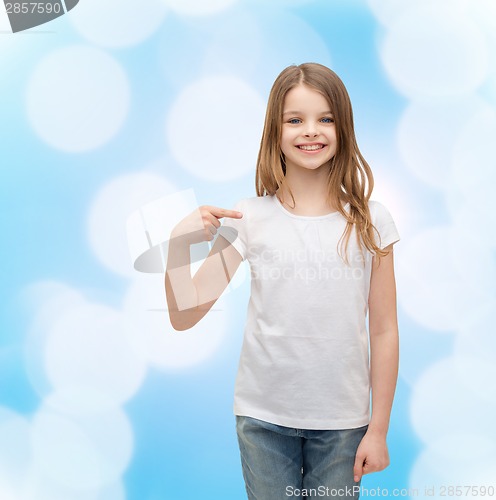 Image of smiling little girl in blank white t-shirt