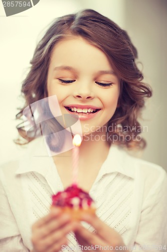 Image of girl with cupcake