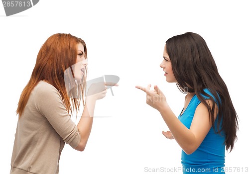 Image of two teenagers having a fight