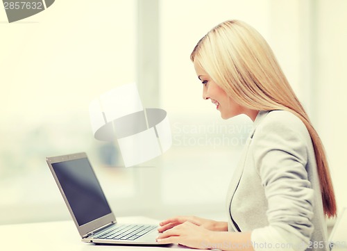 Image of businesswoman with laptop