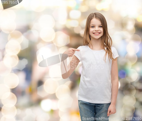 Image of smiling little girl in blank white t-shirt