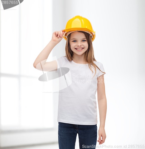 Image of smiling little girl in protective helmet