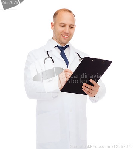 Image of smiling male doctor with clipboard and stethoscope