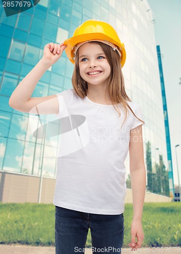 Image of smiling little girl in protective helmet