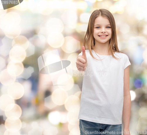 Image of girl in blank white t-shirt showing thumbs up