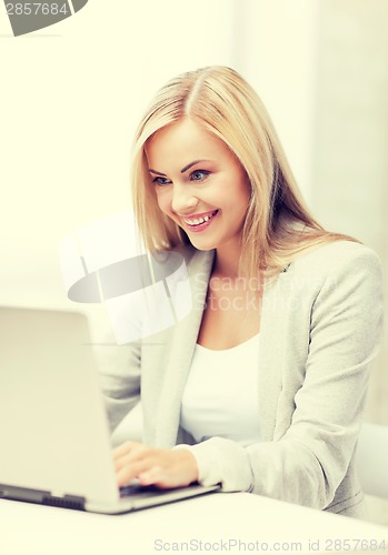 Image of businesswoman with laptop