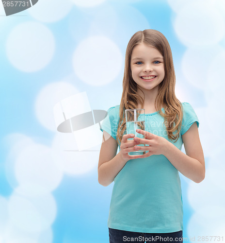 Image of smiling little girl with glass of water