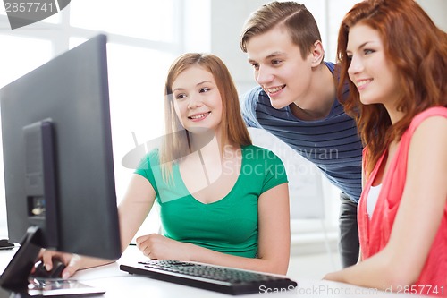 Image of group of smiling students having discussion