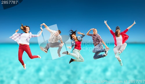 Image of group of teenagers jumping