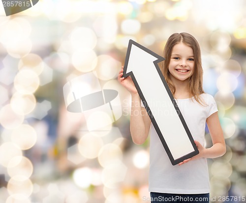 Image of smiling little girl with blank arrow pointing up