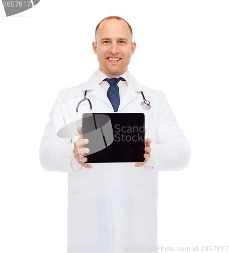Image of smiling male doctor with tablet pc