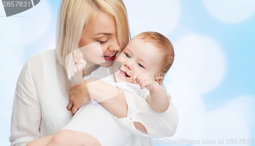 Image of happy mother with smiling baby