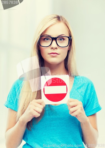 Image of woman with no entry sign