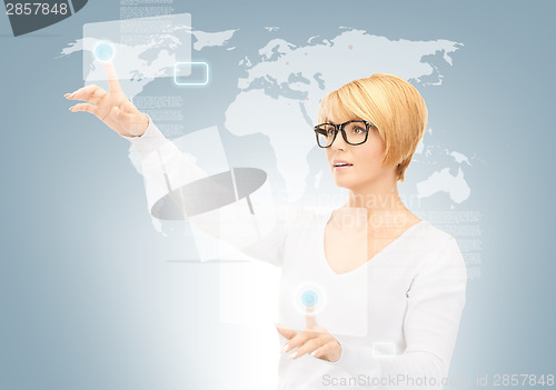 Image of businesswoman working with touch screen