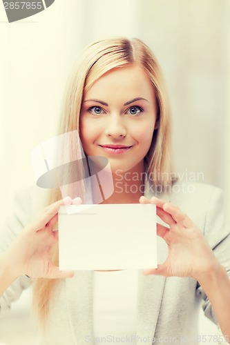 Image of woman with blank business or name card