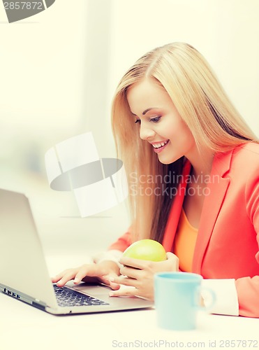 Image of businesswoman with laptop