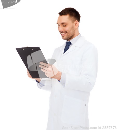 Image of smiling male doctor with clipboard