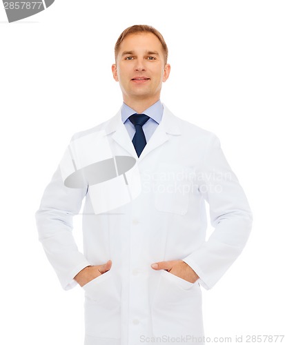 Image of smiling male doctor in white coat