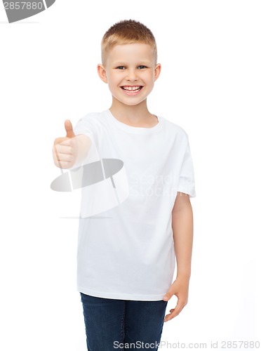Image of boy in blank white t-shirt showing thumbs up