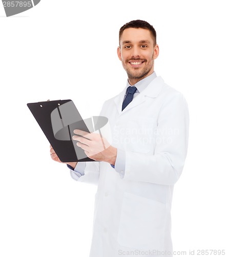 Image of smiling male doctor with clipboard