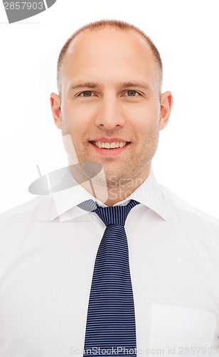 Image of portrait of smiling businessman