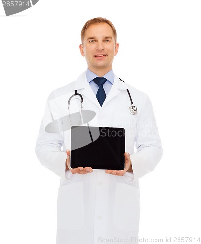 Image of smiling male doctor with tablet pc