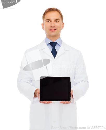 Image of smiling male doctor with tablet pc