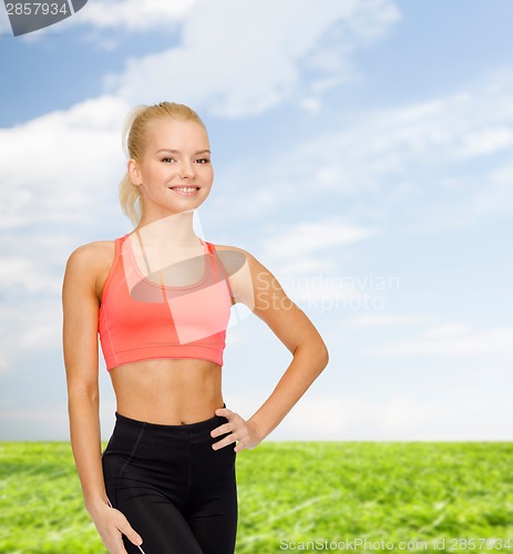 Image of beautiful athletic woman in sportswear
