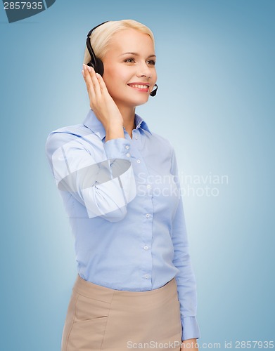 Image of friendly female helpline operator