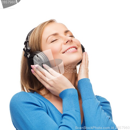 Image of smiling young woman with headphones