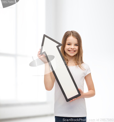 Image of smiling little girl with blank arrow pointing up