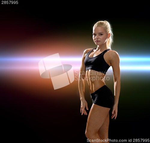 Image of beautiful athletic woman in sportswear