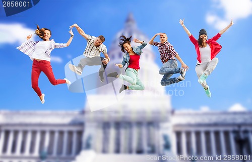 Image of group of teenagers jumping