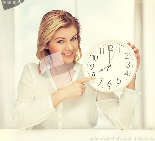 Image of woman with clock