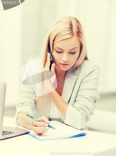 Image of businesswoman with phone