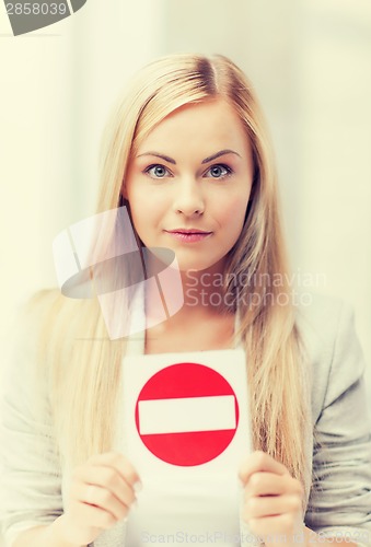 Image of woman with no entry sign