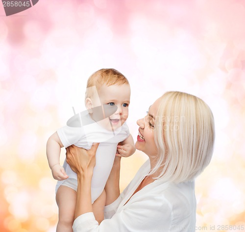 Image of happy mother with smiling baby