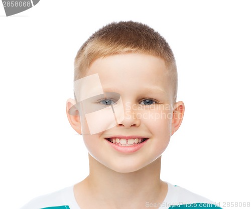 Image of smiling little boy over white background