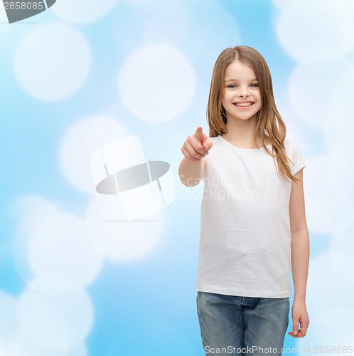 Image of little girl in blank white t-shirt pointing at you