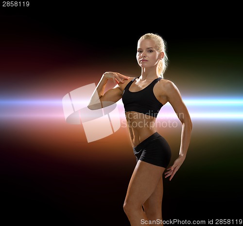 Image of beautiful athletic woman in sportswear