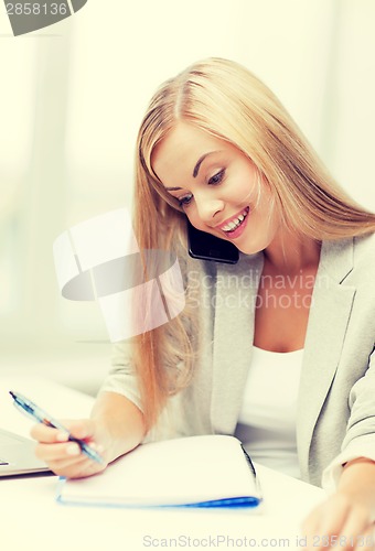 Image of businesswoman with phone