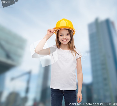 Image of smiling little girl in protective helmet