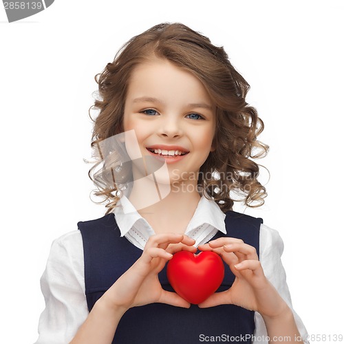 Image of girl with small red heart