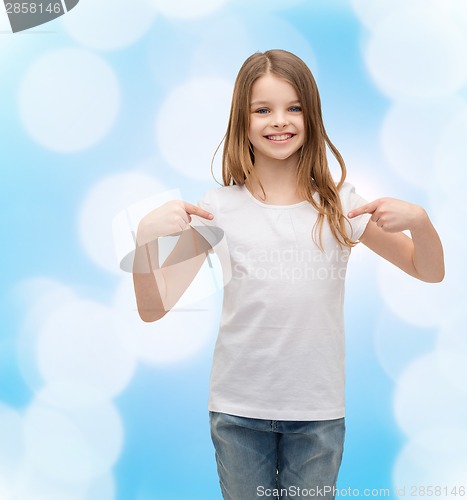 Image of smiling little girl in blank white t-shirt