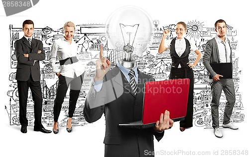 Image of Business Team With Lamp Head
