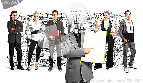 Image of Business Team With Lamp Head