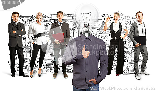 Image of Business Team With Lamp Head