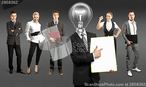 Image of Business Team With Lamp Head